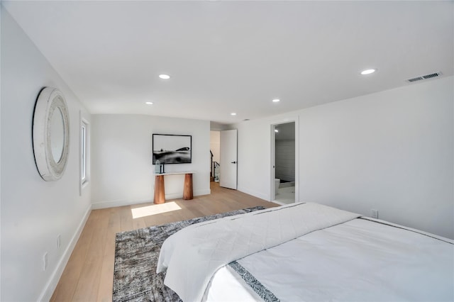 bedroom with recessed lighting, visible vents, light wood finished floors, and baseboards