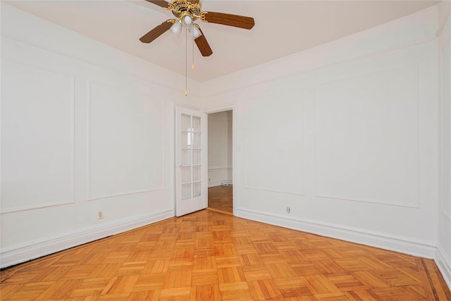 empty room with a decorative wall and a ceiling fan