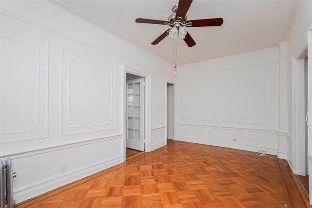 spare room with ceiling fan