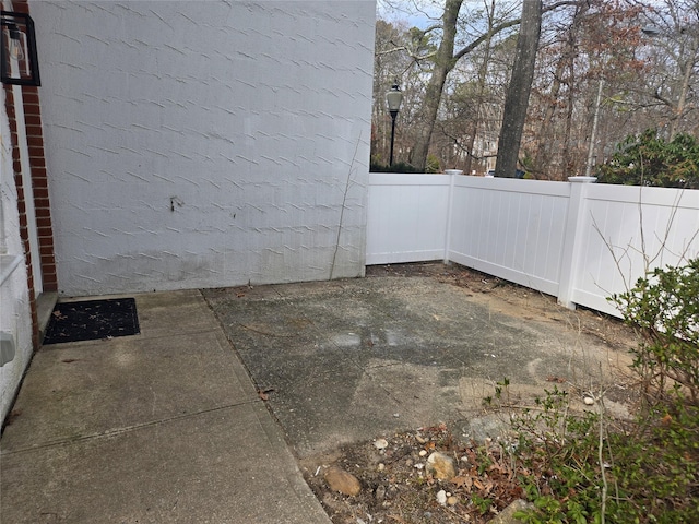 view of patio with fence