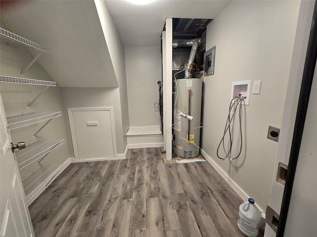 utility room with water heater