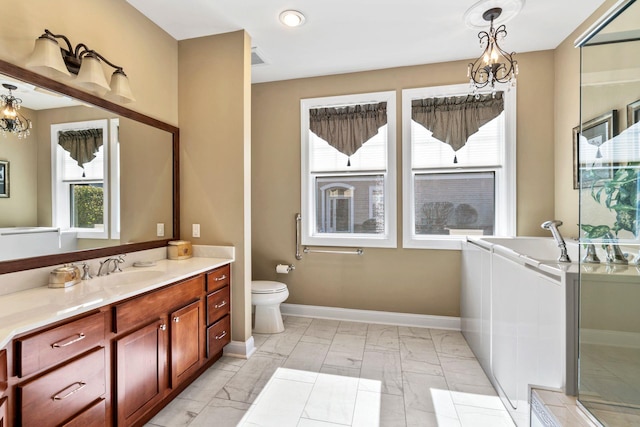 full bathroom with baseboards, toilet, an inviting chandelier, marble finish floor, and vanity