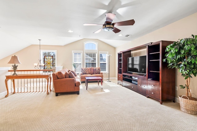 living room with vaulted ceiling, light colored carpet, visible vents, and baseboards