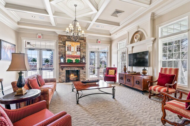 carpeted living area featuring french doors and plenty of natural light