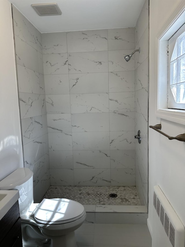 21 Ravine Rd, Great Neck, NY 11023 - bathroom featuring visible vents, a stall shower, toilet, and radiator heating unit