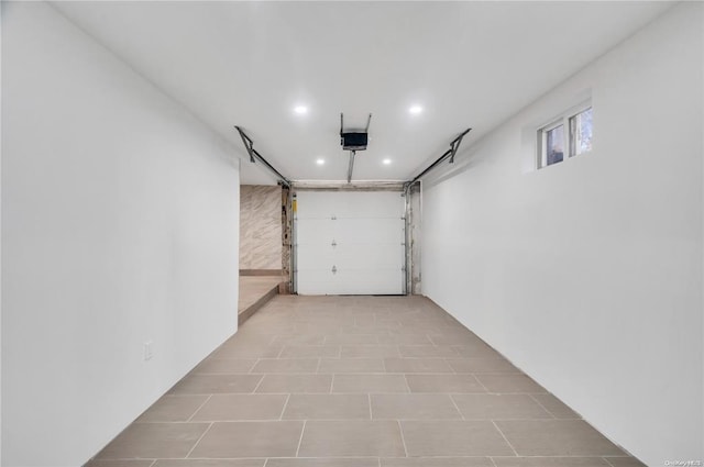 21 Ravine Rd, Great Neck, NY 11023 - garage with recessed lighting and a garage door opener