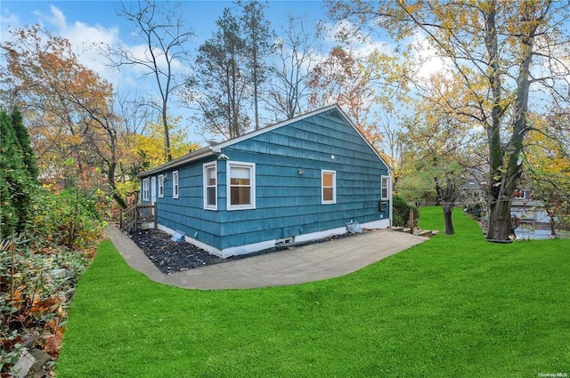 21 Ravine Rd, Great Neck, NY 11023 - view of side of home with a lawn