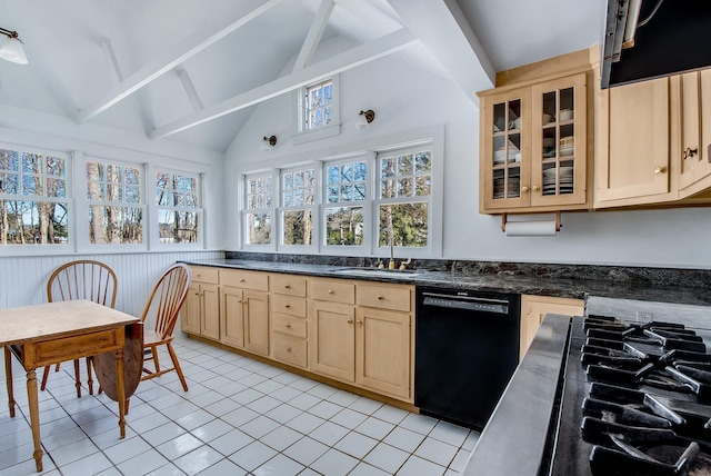 kitchen with light brown cabinets, vaulted ceiling with beams, a wainscoted wall, black appliances, and a sink