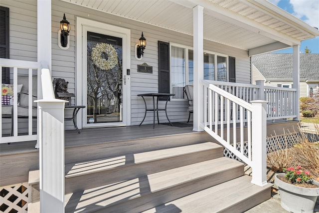 property entrance with covered porch