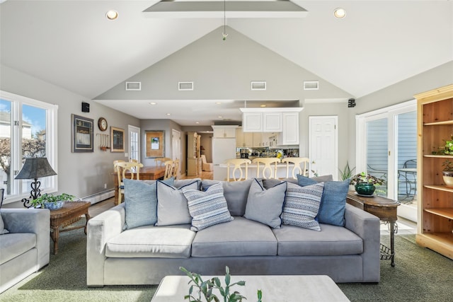 living room featuring visible vents and baseboard heating