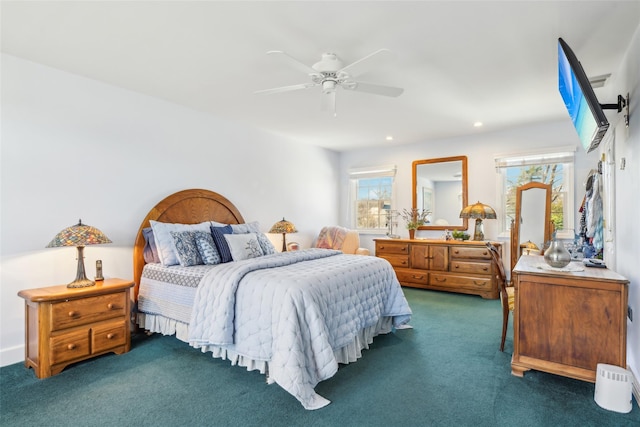 bedroom featuring dark colored carpet, a ceiling fan, and recessed lighting