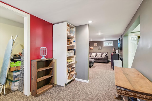 hall featuring recessed lighting and carpet