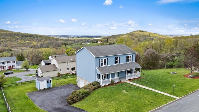 aerial view with a wooded view