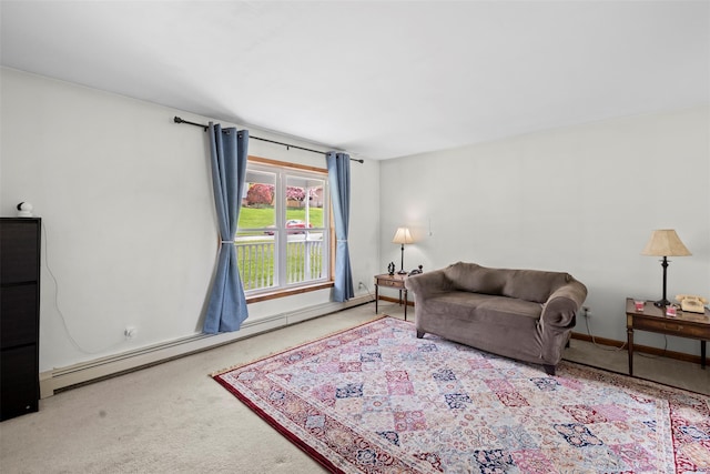 living area featuring baseboards, carpet, and a baseboard radiator