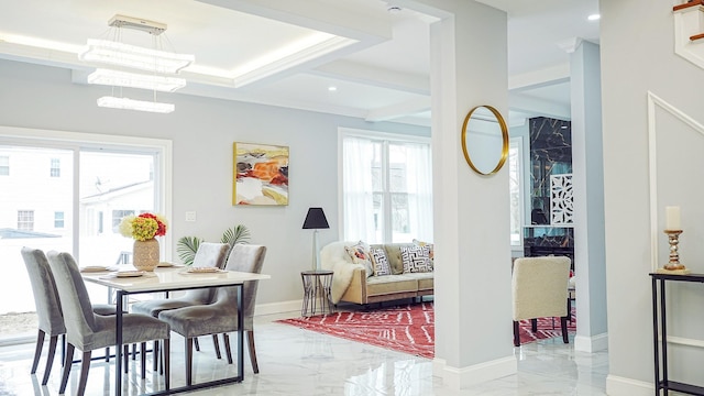 dining area featuring recessed lighting, a notable chandelier, baseboards, and marble finish floor