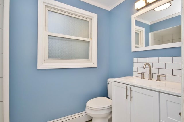 bathroom featuring vanity, toilet, tasteful backsplash, and ornamental molding