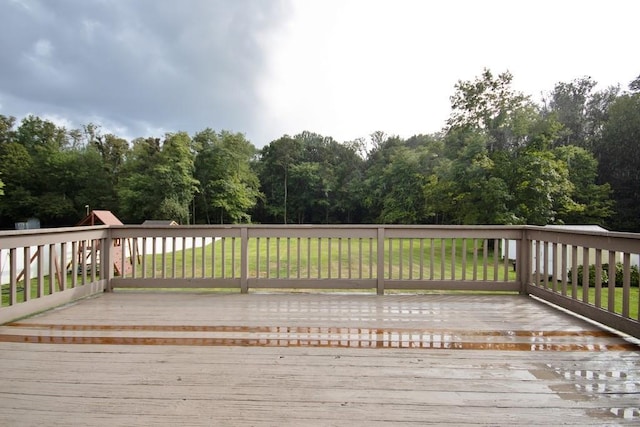 deck featuring a yard