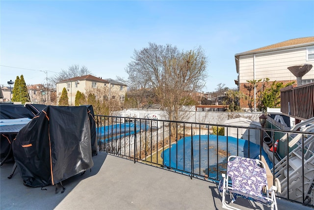 balcony featuring a grill and a patio area