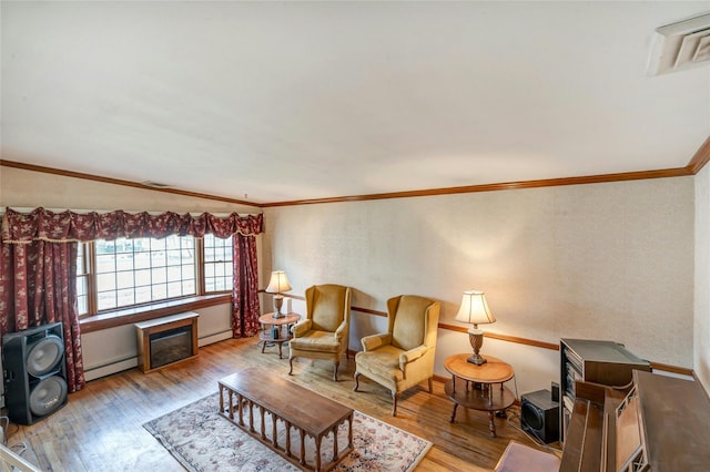 101 Grissom Way, Hauppauge, NY 11788 - living area featuring ornamental molding, wood-type flooring, a baseboard heating unit, and visible vents