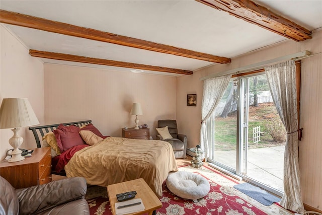 101 Grissom Way, Hauppauge, NY 11788 - bedroom featuring access to exterior and beamed ceiling