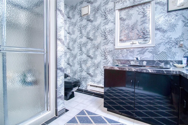 full bathroom featuring vanity, wallpapered walls, a stall shower, tile patterned floors, and toilet