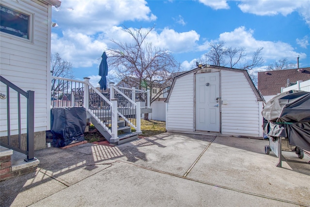 view of shed with stairway