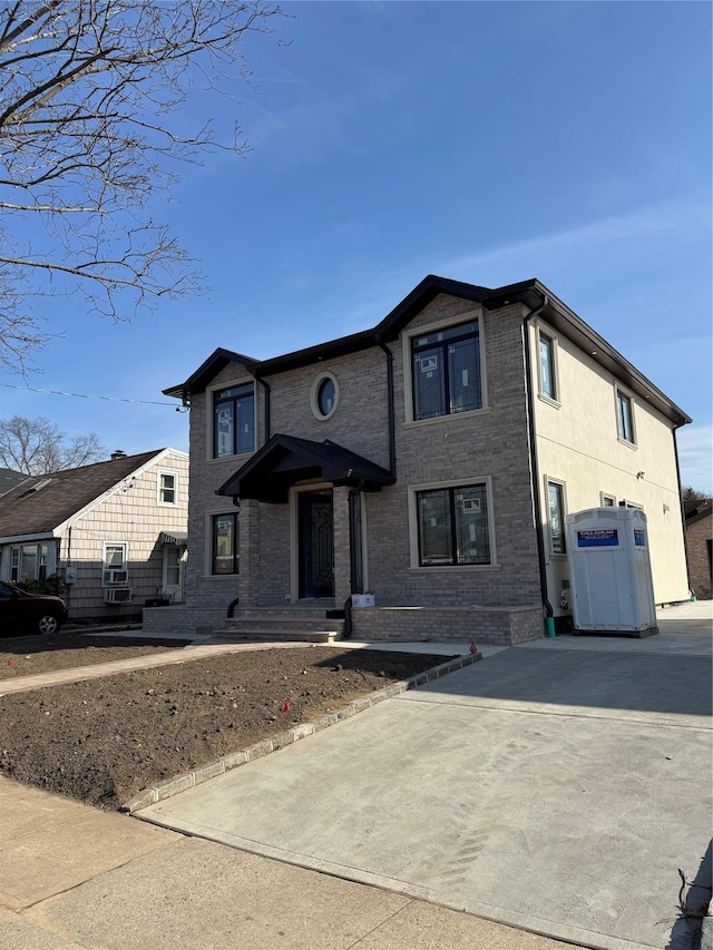 view of front of property with brick siding