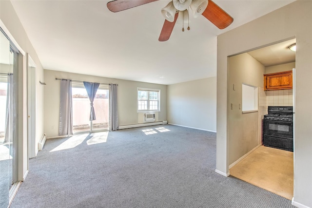 unfurnished living room with light carpet, baseboard heating, a baseboard heating unit, and baseboards