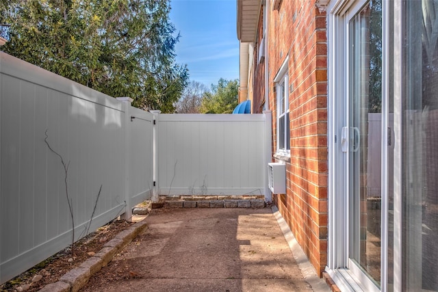 view of patio featuring a fenced backyard