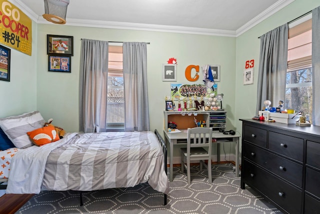 bedroom with baseboards and ornamental molding