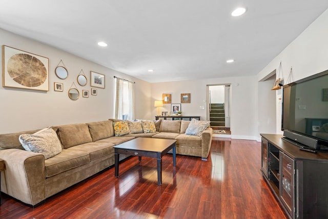 living area with dark wood finished floors, recessed lighting, and baseboards