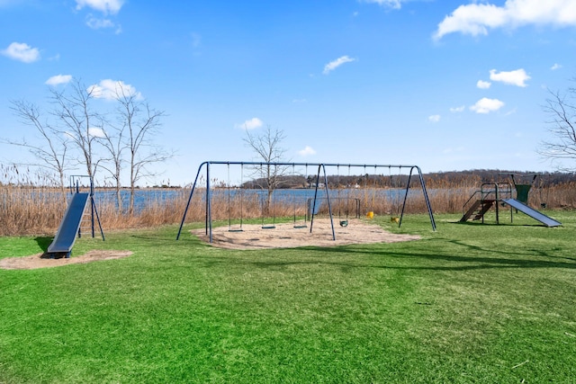 community playground featuring a yard