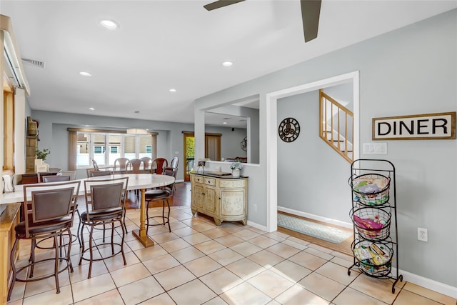 kitchen featuring recessed lighting, visible vents, baseboards, and a ceiling fan