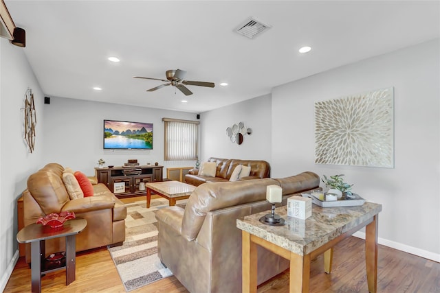 living room featuring visible vents, recessed lighting, light wood-type flooring, and a ceiling fan