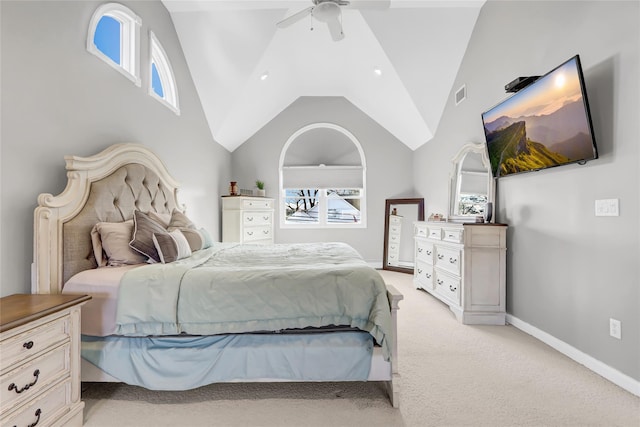 bedroom featuring visible vents, multiple windows, light colored carpet, and vaulted ceiling