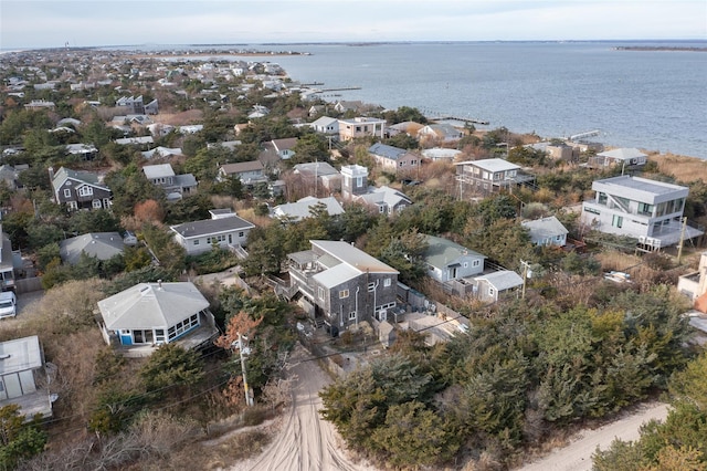 bird's eye view with a water view and a residential view