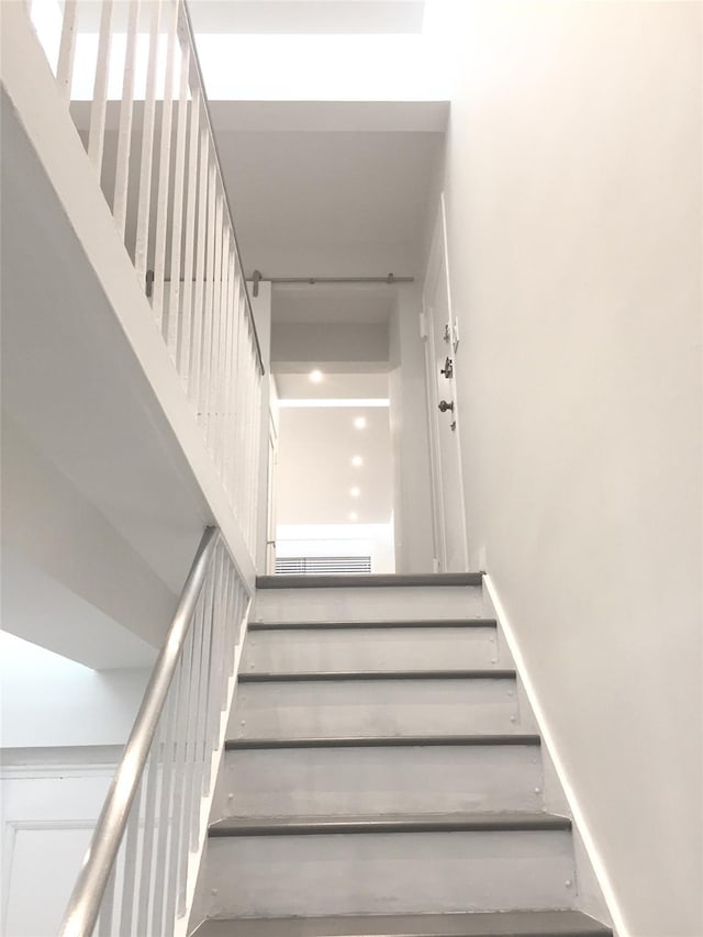 stairs with a high ceiling