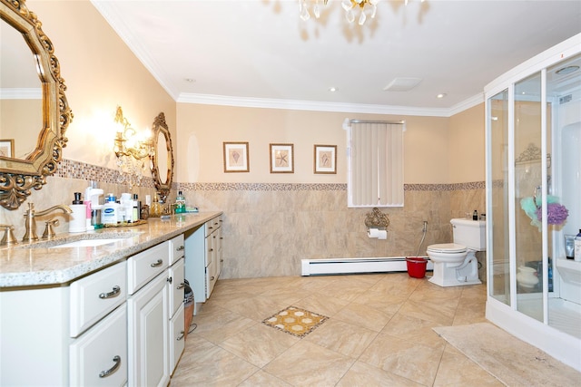 bathroom with toilet, a stall shower, a baseboard heating unit, crown molding, and vanity