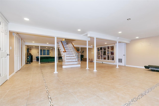 interior space featuring decorative columns, recessed lighting, and baseboards