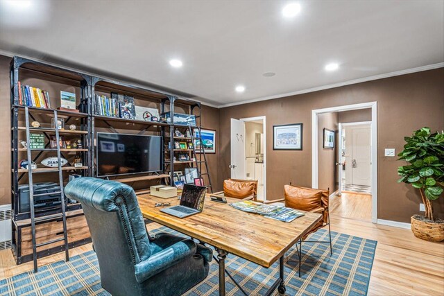 home office featuring crown molding, recessed lighting, and wood finished floors
