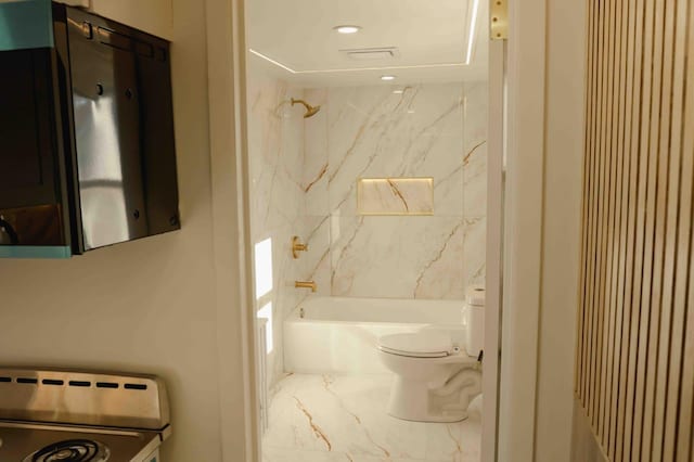 full bath with recessed lighting, marble finish floor, toilet, and washtub / shower combination