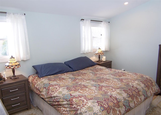 bedroom with recessed lighting