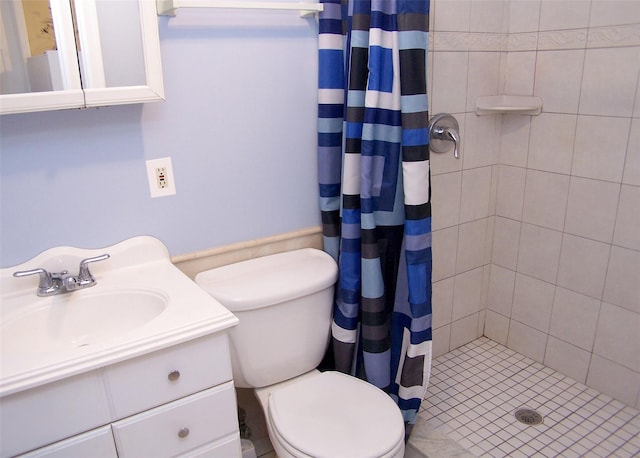 full bathroom featuring vanity, toilet, and a stall shower