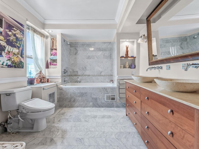 bathroom featuring toilet, ornamental molding, visible vents, and a sink