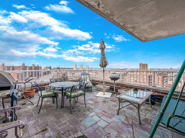 view of patio featuring a city view