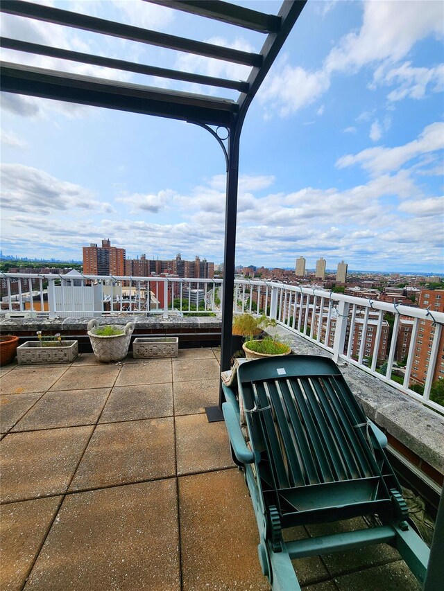 10740 Queens Blvd Pha, Pha, Forest Hills, NY 11375 - view of patio / terrace featuring a city view and a pergola