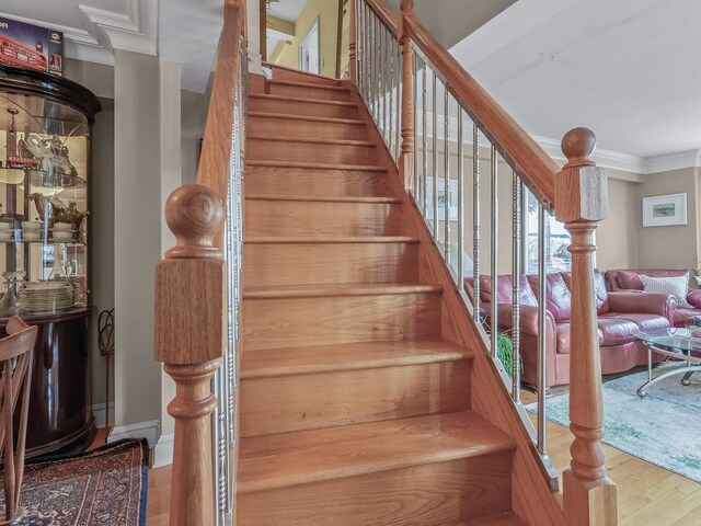 10740 Queens Blvd Pha, Pha, Forest Hills, NY 11375 - stairway with wood finished floors and crown molding