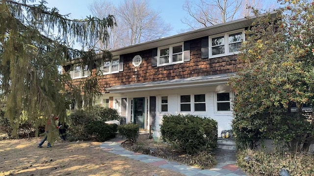 townhome / multi-family property featuring brick siding