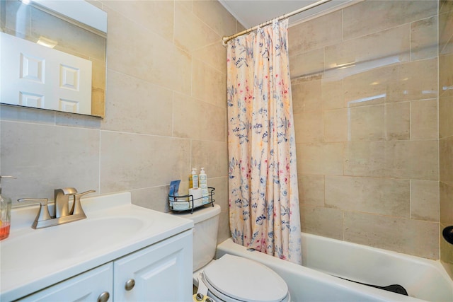 full bath featuring shower / tub combo with curtain, toilet, backsplash, tile walls, and vanity