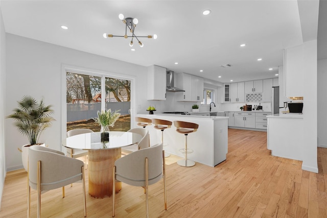 250 Blauvelt Rd, Pearl River, NY 10965 - dining area with light wood finished floors, visible vents, recessed lighting, and a chandelier